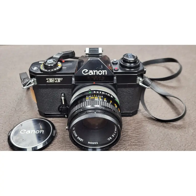 Canon EF 35mm Camera body S# 342529 with Canon 50mm Lens S# 1143855